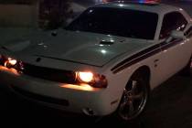 A white Dodge Challenger driven by an off-duty Metropolitan Police Department officer was invol ...