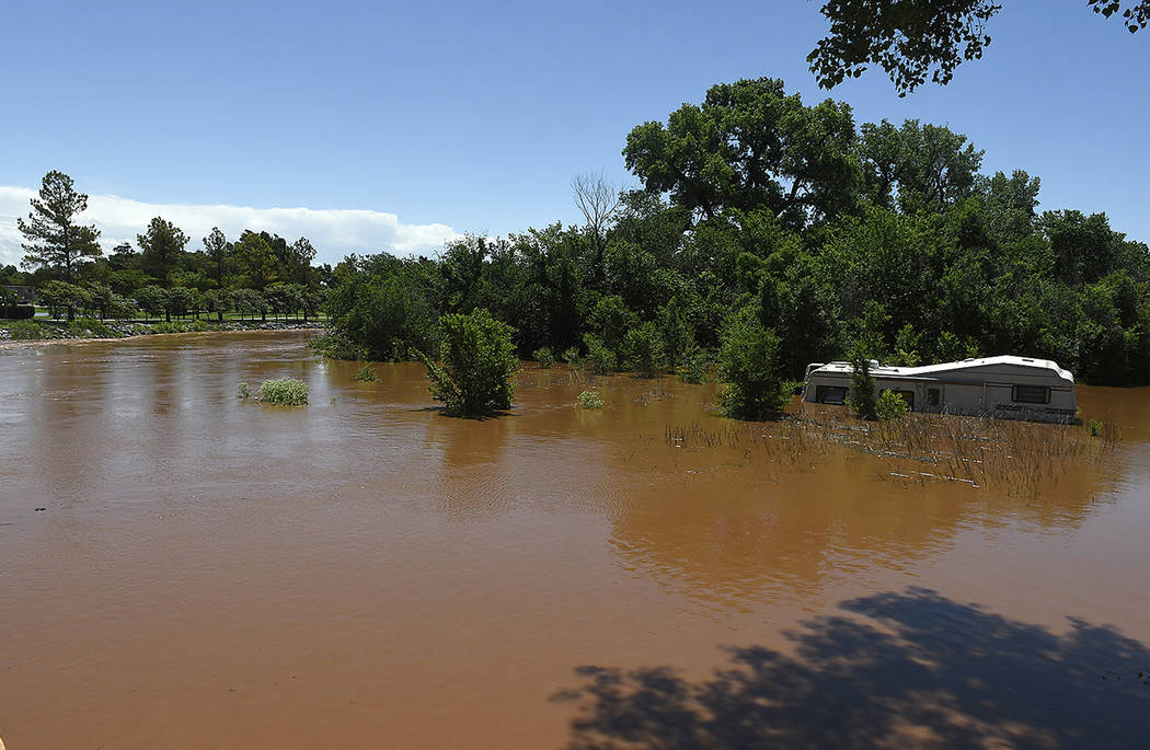 Uncle John Creek is overflowing it's banks in Kingfisher, Okla., Tuesday May 21, 2019. (Billy H ...