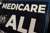 A sign is shown during a news conference April 10, 2019, to reintroduce "Medicare for All" legi ...