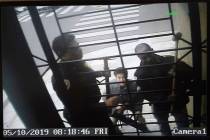 In this May 10, 2019, image from video provided by @bryancarmody, are San Francisco police arme ...