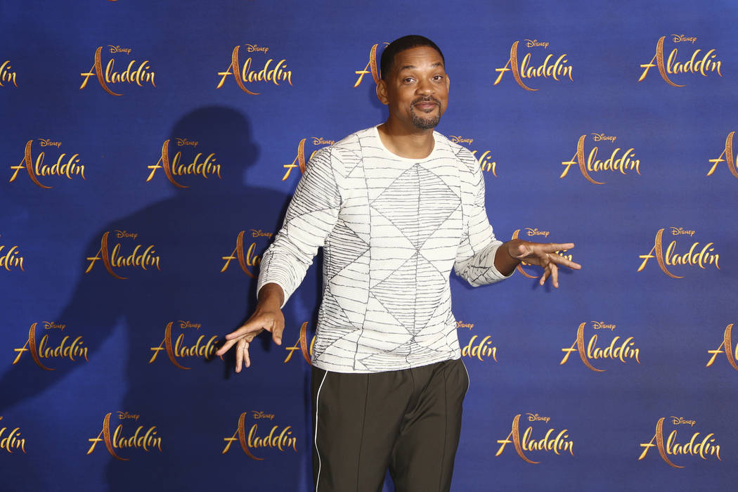 Actor Will Smith poses for photographers at the photo call for the film 'Aladdin' in London, Fr ...