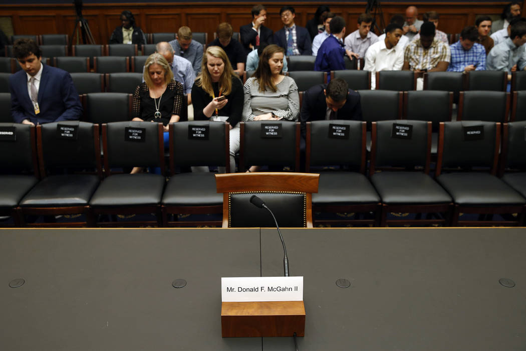 A name placard is displayed for former White House Counsel Don McGahn, who is not expected to a ...