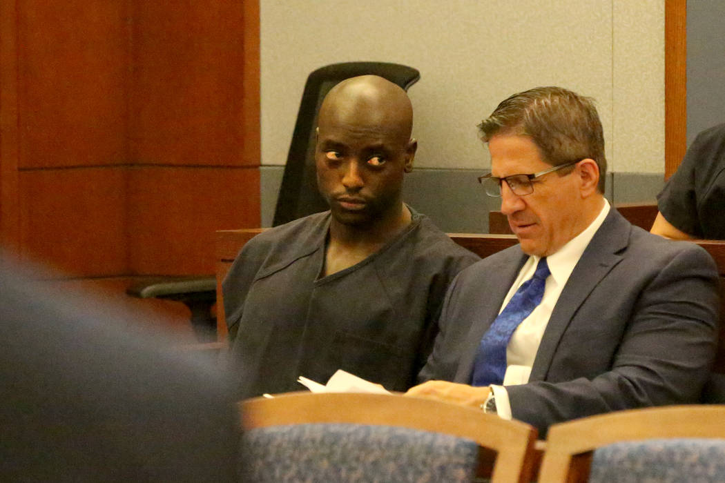 Former NFL player Cierre Wood, left, who along with his girlfriend, is charged with first-degre ...