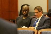 Former NFL player Cierre Wood, left, who along with his girlfriend, is charged with first-degre ...