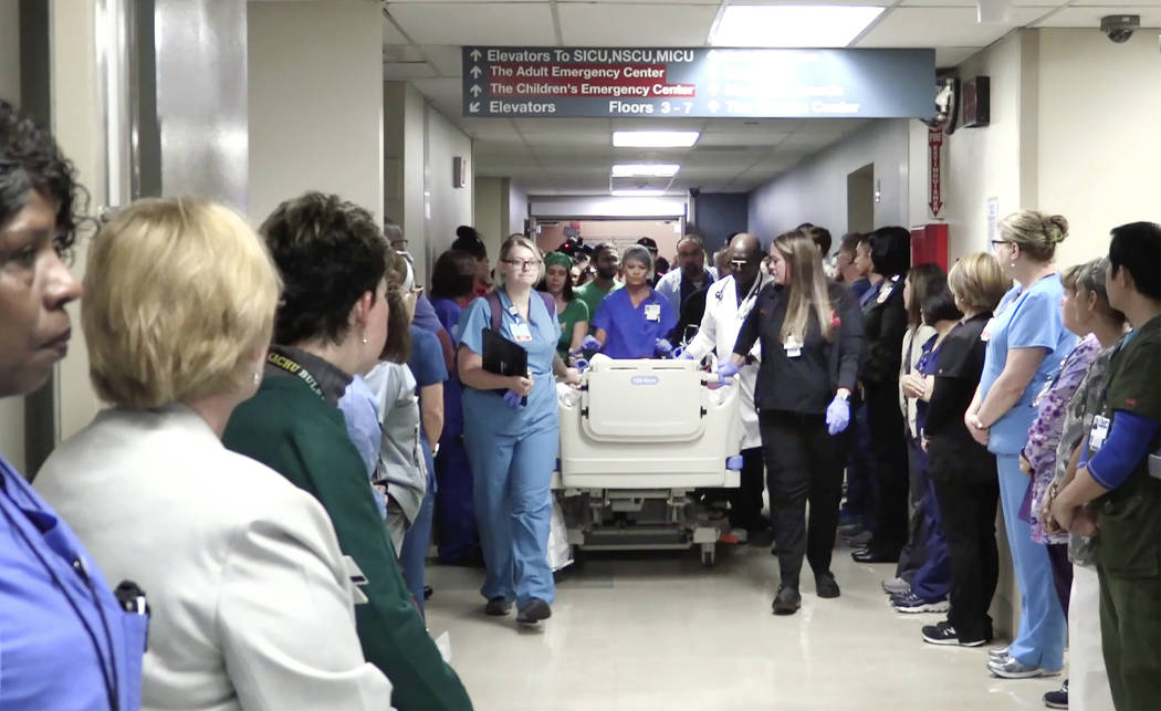 University Medical Center staff holds donor walk for Michael Sigler on Wednesday, May 22, 2019 ...