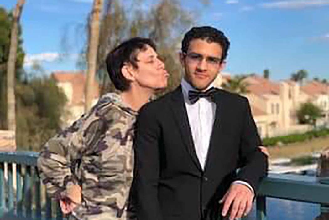 Michael Sigler with his mother, Courtney Kaplan. Sigler was critically