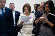 Speaker of the House Nancy Pelosi, D-Calif., departs a meeting with the Democratic Caucus where ...