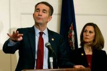 FILE - In this Feb. 2, 2019 file photo, Virginia Gov. Ralph Northam, left, gestures as his wife ...