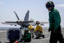 In a photo, released by U.S. Navy, an F/A-18E Super Hornet from the "Jolly Rogers" of Strike Fi ...