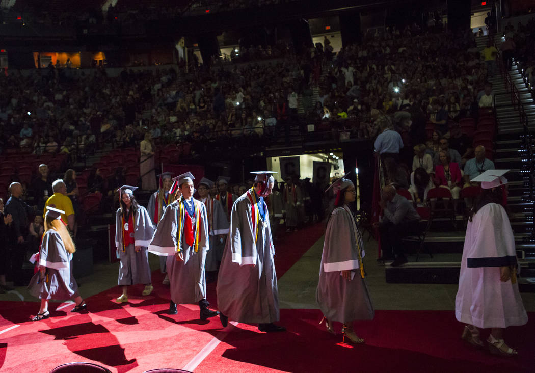 Graduating Coronado High School valedictorians walk during the processional at their graduation ...