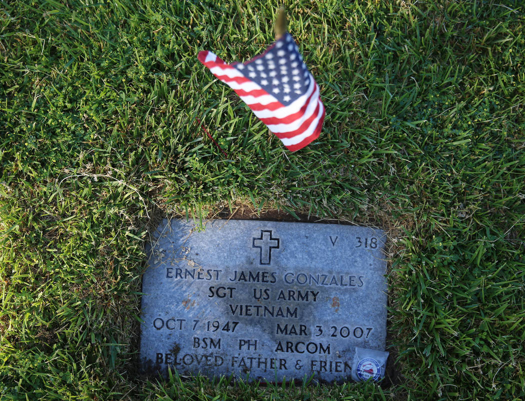 The gravesite of Ernest James Gonzales, U.S. Army veteran who served in Vietnam, during the ann ...