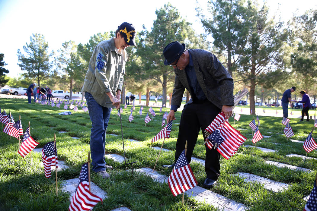 Nevada Department of Veterans Services Director Kat Miller, left, and volunteer Richard Armstro ...