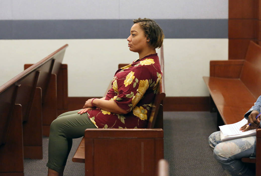 Cadesha Bishop, 25, accused of shoving a 74-year-old man off a bus, appears in court during her ...