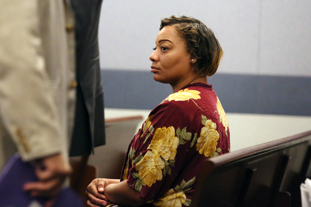 Cadesha Bishop, 25, accused of shoving a 74-year-old man off a bus, appears in court during her ...