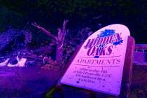 The sign for the Hidden Oaks apartment complex in Jefferson City Missouri stands bent on May 23 ...