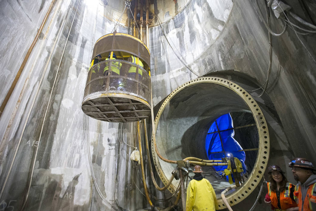 People are raised from the access shaft during a tour of the Southern Nevada Water Authority's ...