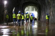 Members of the media and workers during tour of the Southern Nevada Water Authority's low-lake- ...
