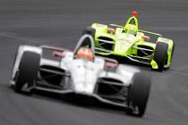 Simon Pagenaud, of France, follows Santino Ferrucci into turn one during practice for the India ...