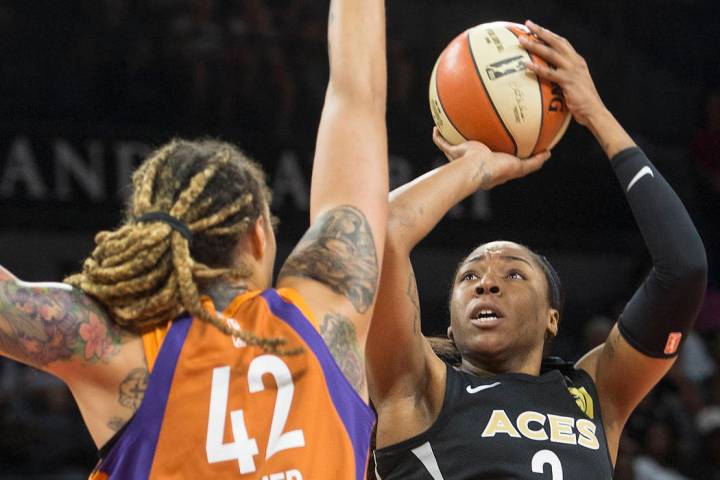 Aces center Kelsey Bone (3) shoots over Phoenix Mercury center Brittney Griner (42) in the firs ...