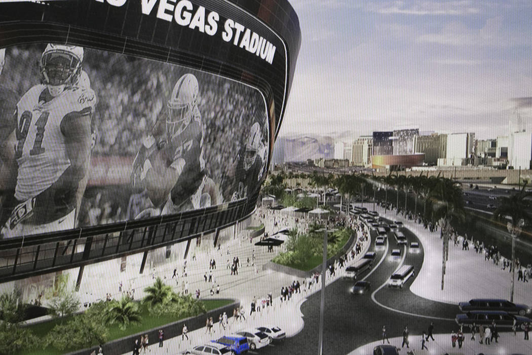 A rendering of the new Raiders stadium during a presentation about the Las Vegas Raiders stadiu ...