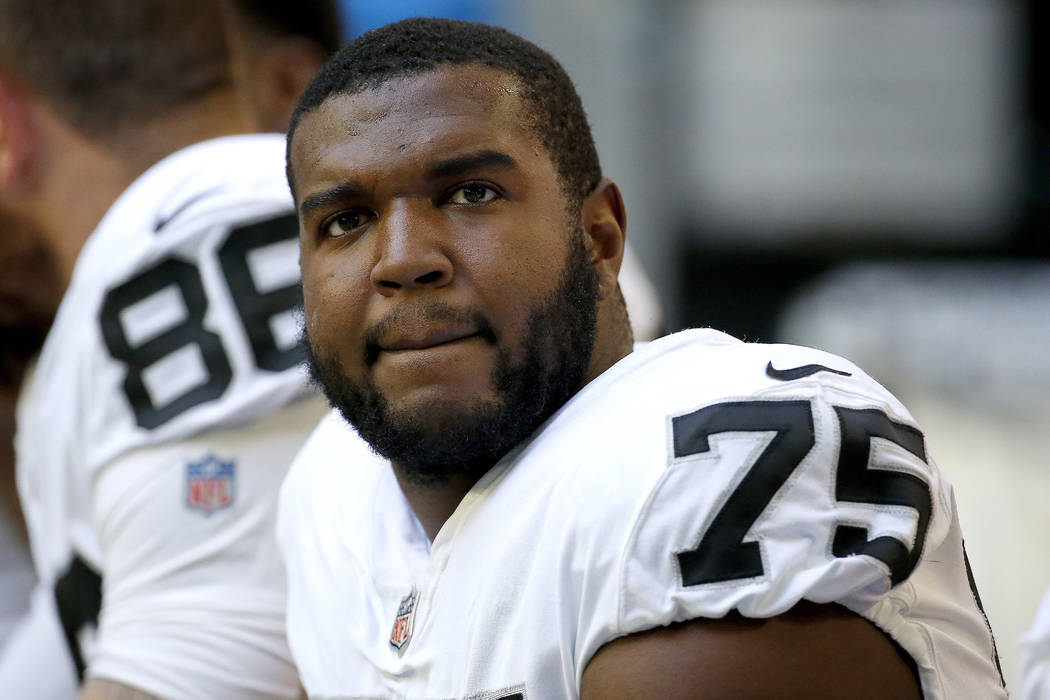 Oakland Raiders offensive tackle Brandon Parker (75) watches during the first half of an NFL fo ...