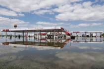 A Sapp Bros. gas station in Percival, Iowa, stands in floodwaters from the Missouri River, Frid ...