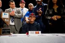 Senior Randal Grimes signs to play college football for University of Southern California at De ...