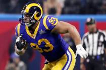In this Feb. 3, 2019, file photo, Los Angeles Rams' Ndamukong Suh chases the action during NFL ...
