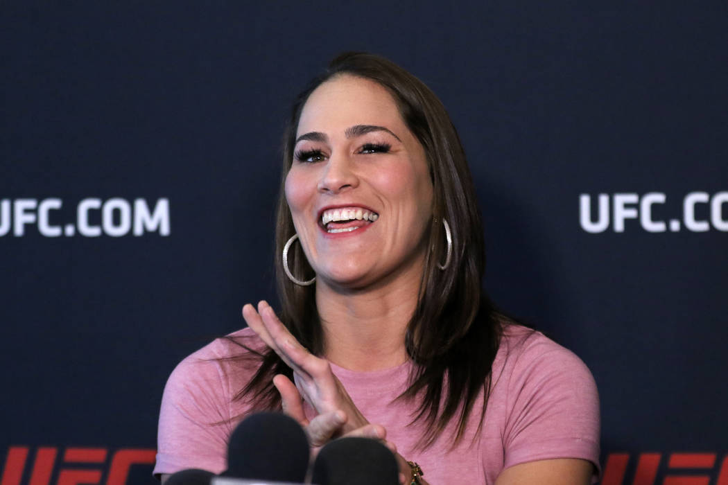 UFC flyweight contender Jessica Eye laughs as she answers a question at a media event at the UF ...