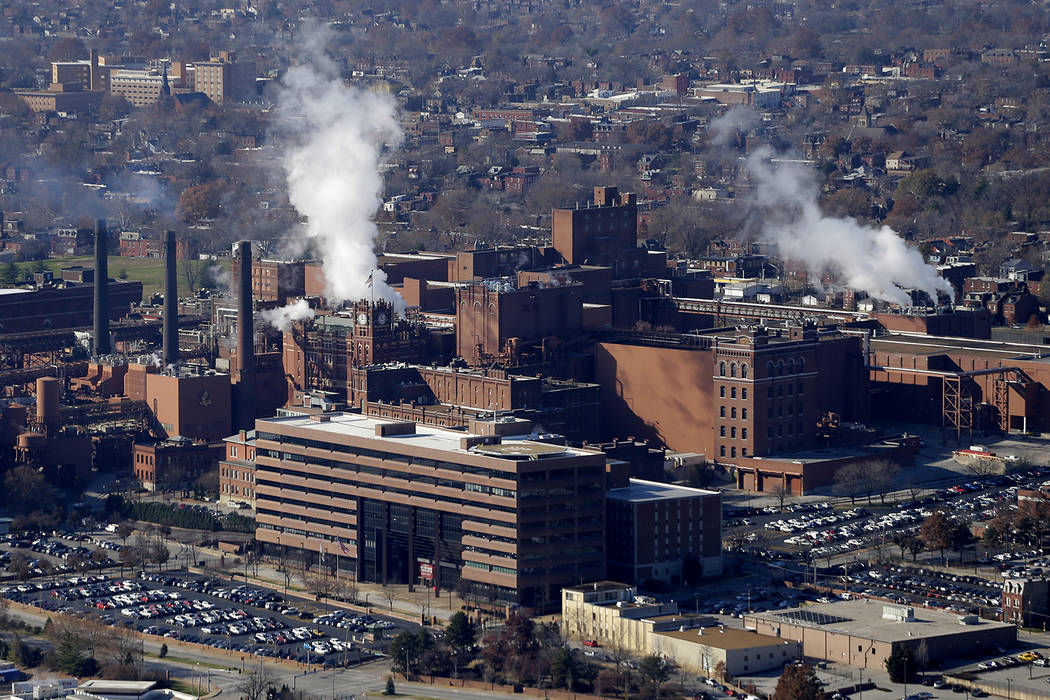 In this Tuesday, Nov. 25, 2014 file aerial photo, the Anheuser-Busch brewing complex is seen in ...