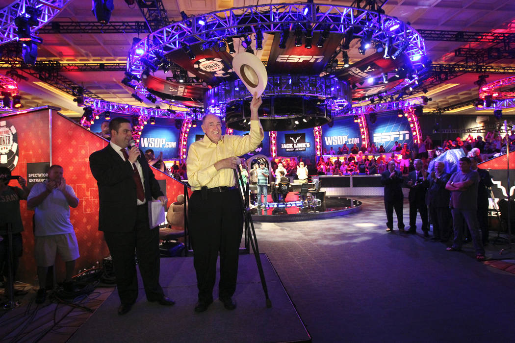 Tournament Director Jack Effel, left, introduces poker legend Doyle Brunson who announced &quot ...