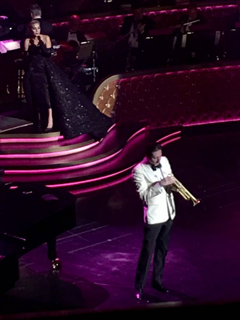 Lady Gaga sings behind the trumpet artistry of Brian Newman during her appearance at Encore The ...