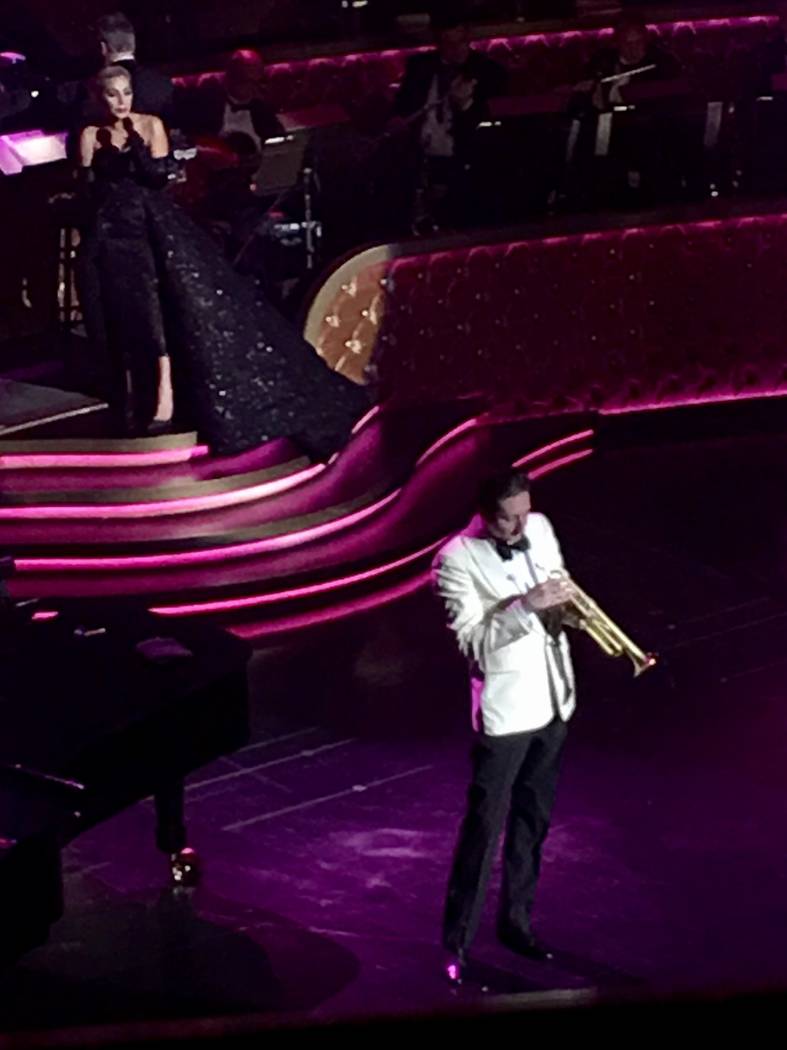 Lady Gaga sings behind the trumpet artistry of Brian Newman during her appearance at Encore The ...