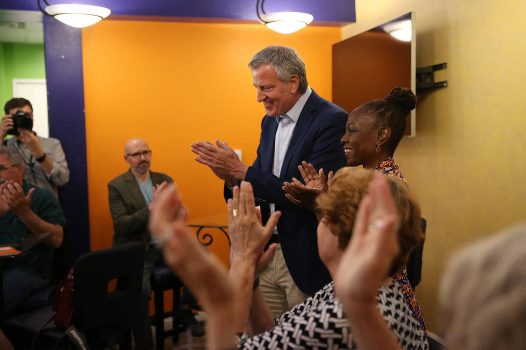 New York Mayor Bill de Blasio, left, a Democratic presidential candidate, with his wife Chirlan ...