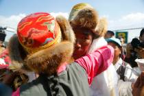 Nepalese veteran Sherpa guide Kami Rita, 49, is welcomed by his sister at the airport in Kathma ...