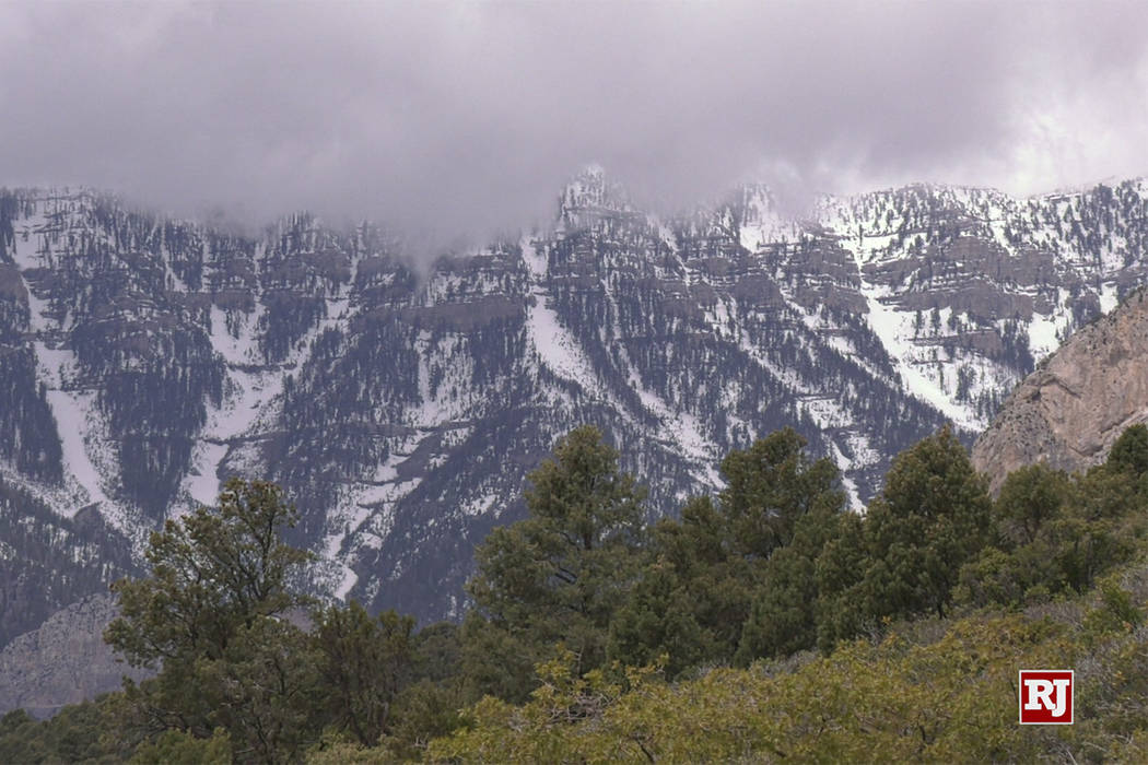 The eaks of Mount Charleston and Lee Canyon Ski area are covered in early morning snow Sunday, ...