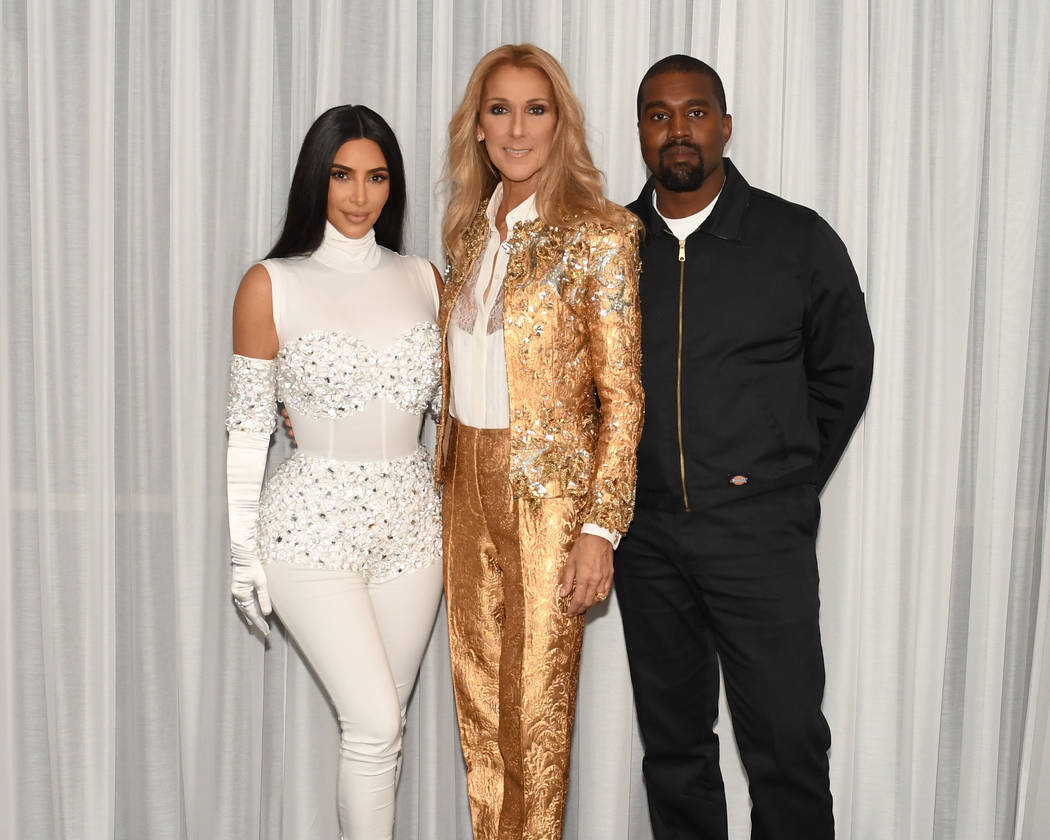 Kim Kardashian and Kanye West are shown with Celine Dion at Caesars Palace on Saturday, May 25, ...