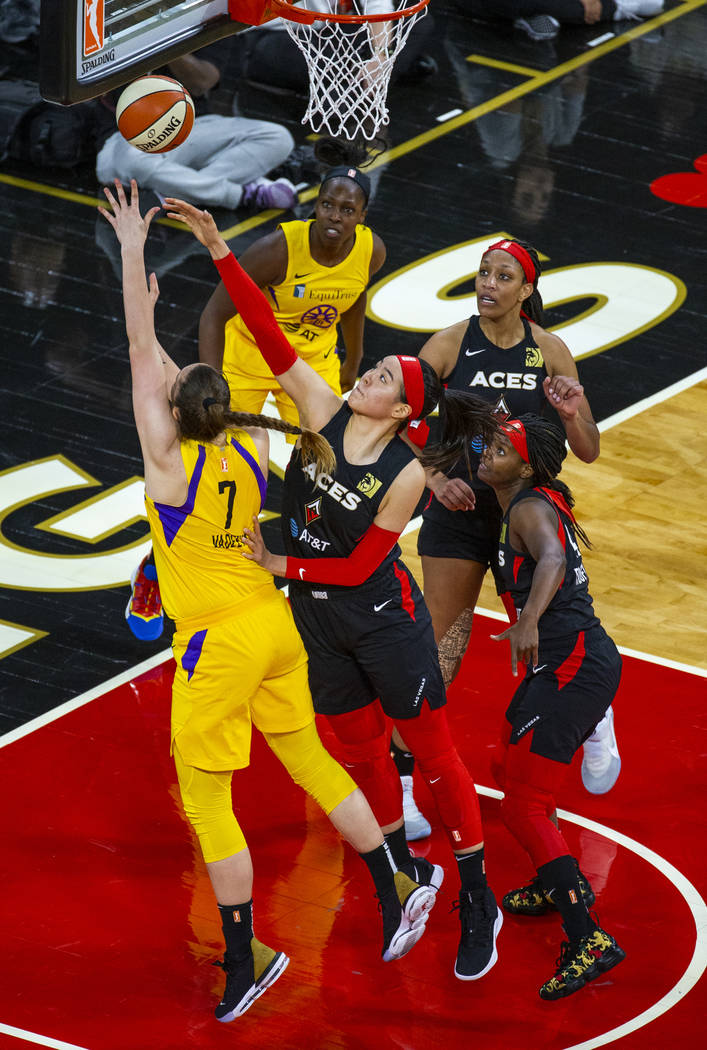 Los Angeles Sparks forward/center Maria Vadeeva (7) has a shot rejected by Las Vegas Aces cente ...