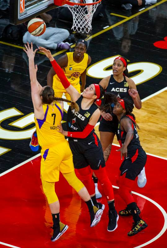 Los Angeles Sparks forward/center Maria Vadeeva (7) has a shot rejected by Las Vegas Aces cente ...