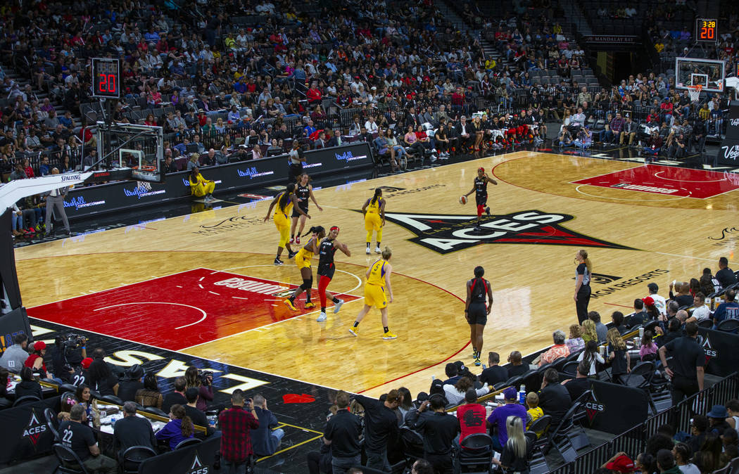 Las Vegas Aces guard Sydney Colson (51) brings up the ball against the Los Angeles Sparks durin ...