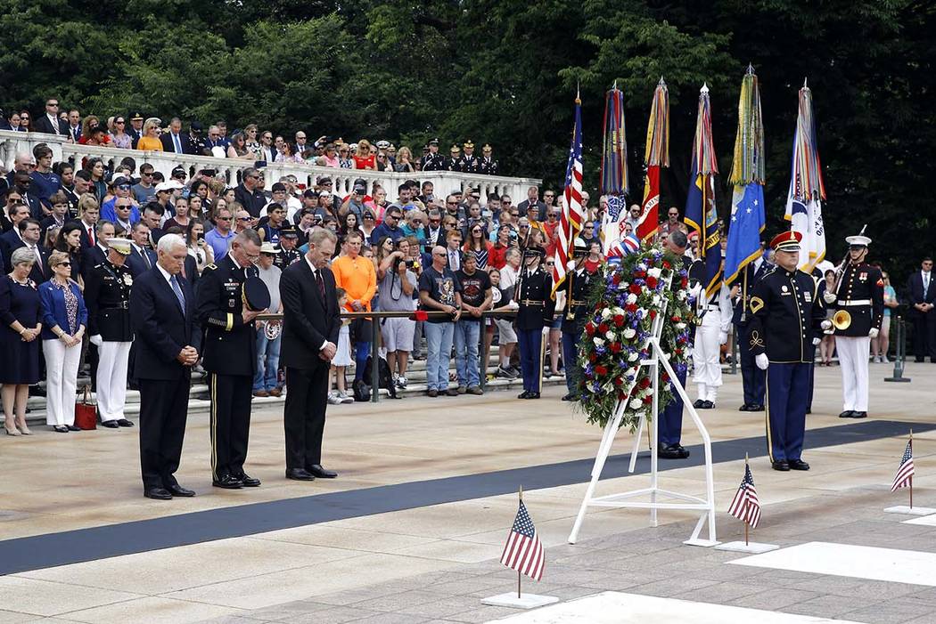 Vice President Mike Pence, from left, U.S. Army Maj. Gen. Michael Howard and acting Defense Sec ...