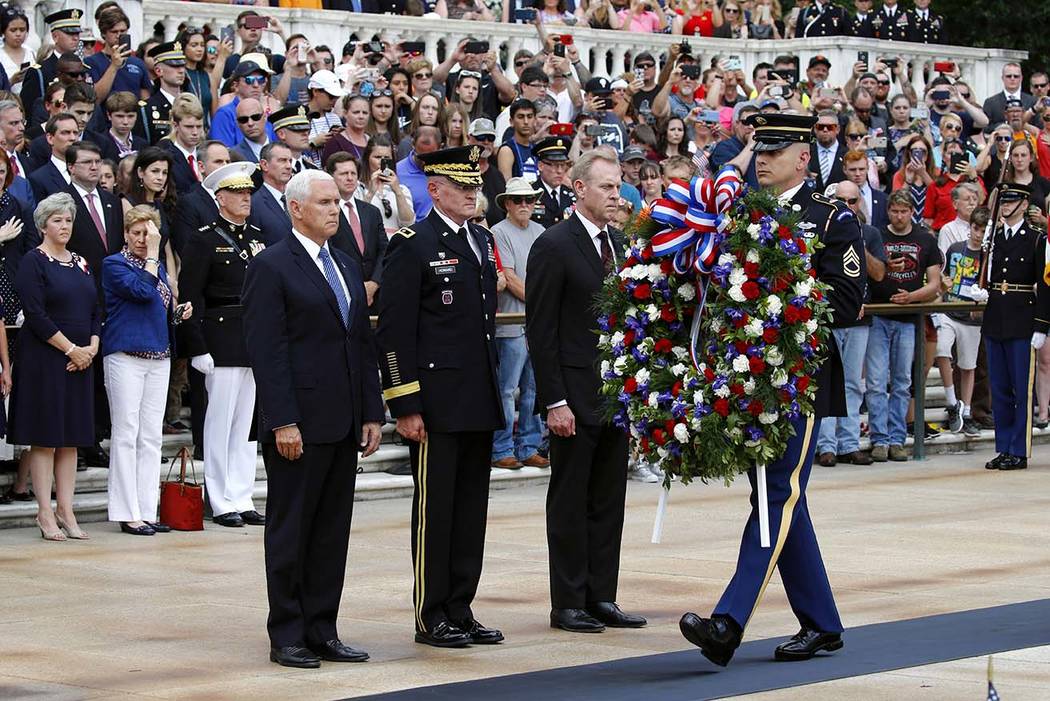 Vice President Mike Pence, from left, U.S. Army Maj. Gen. Michael Howard and acting Defense Sec ...