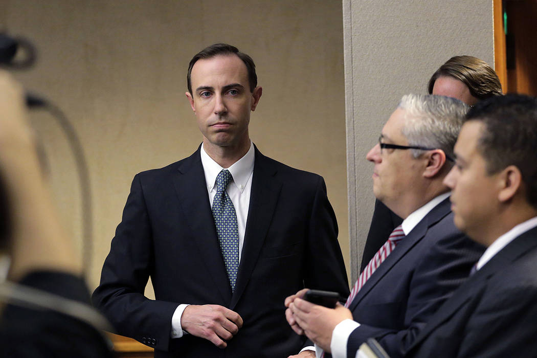 FILE - In this Feb. 7, 2019 file photo, Secretary of State David Whitley, left, arrives for his ...