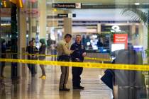 An LVMPD crime scene investigator and officer are inside the Fashion Show mall on the Strip aft ...