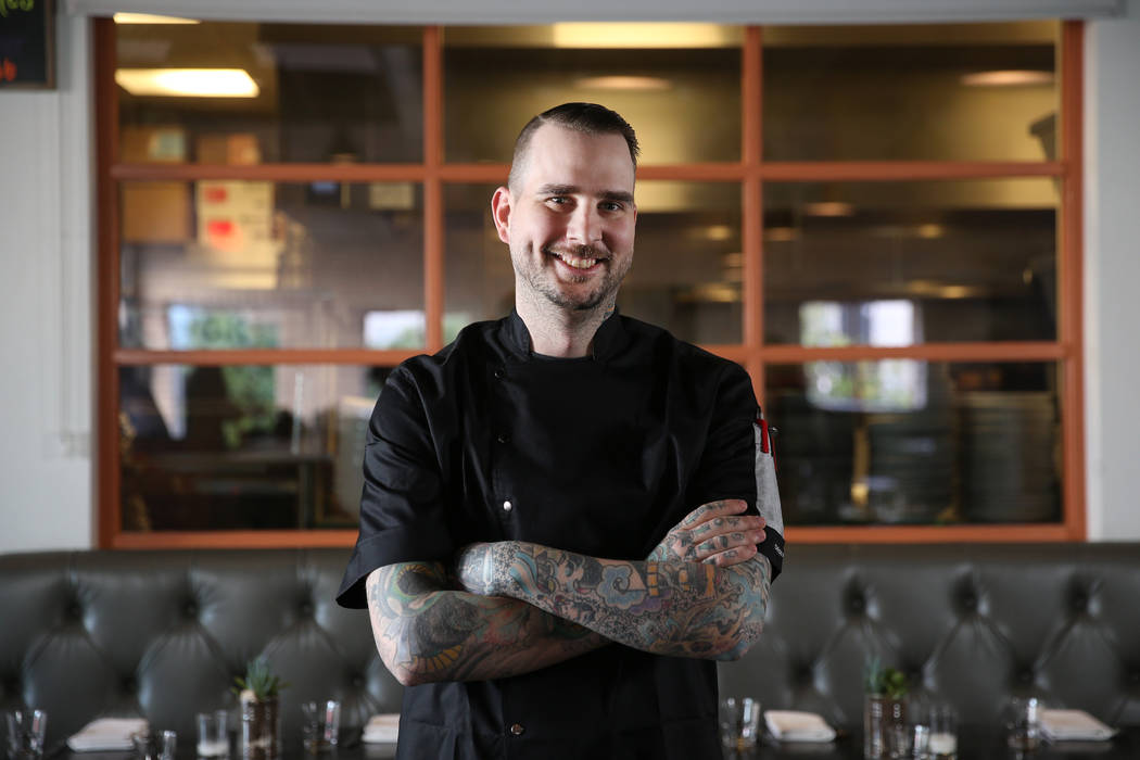 Jackson Stamper, executive chef of the Kitchen at Atomic, poses inside the restaurant in Las Ve ...
