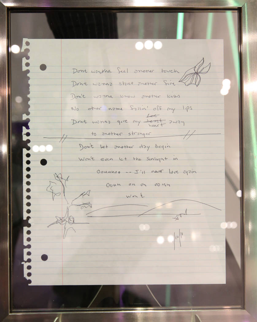 Framed handwritten lyrics to "I'will Never Love Again", written by Jackson Maine (Bra ...