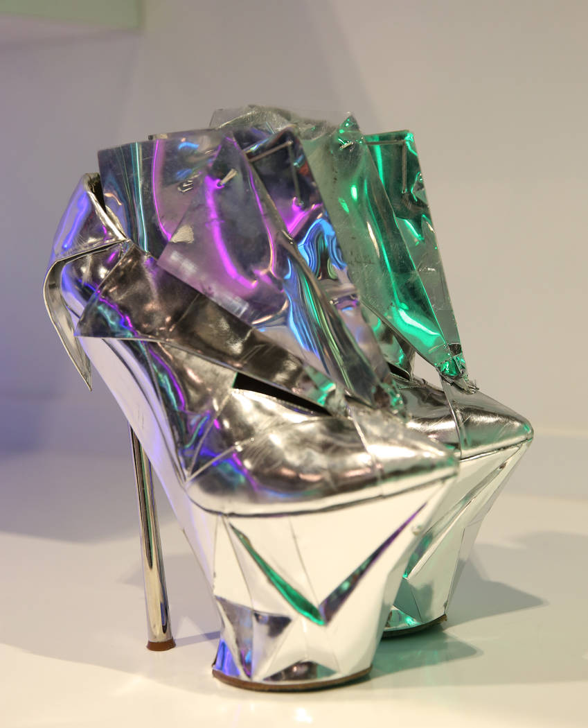 Custom boots worn by Lady Gaga is displayed at Haus of Gaga store during a media preview on Wed ...