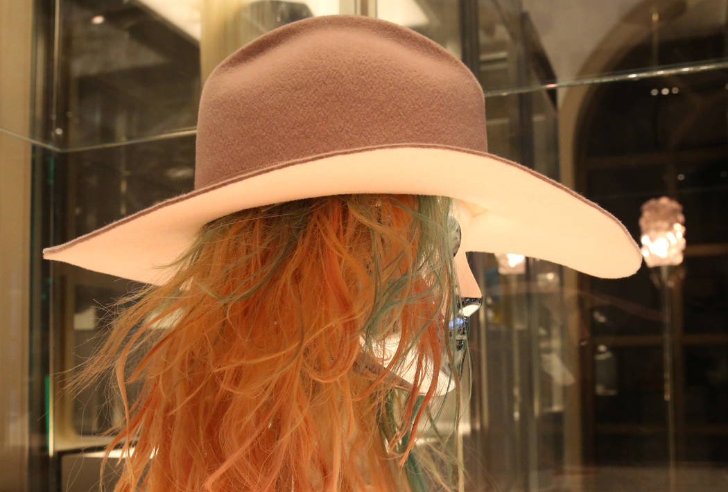 Custom "Millennial Pink" wide-brim cowboy hat worn by Lady Gaga is displayed at Haus ...