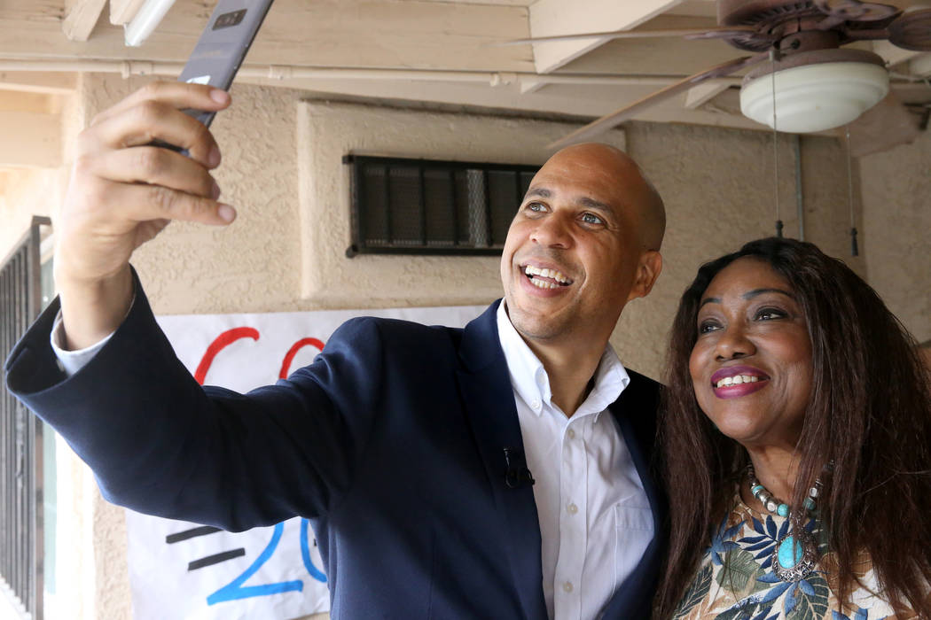 Presidential hopeful Sen. Cory Booker, D-N.J., takes a selfie Miriam Gibson of North Las Vegas ...