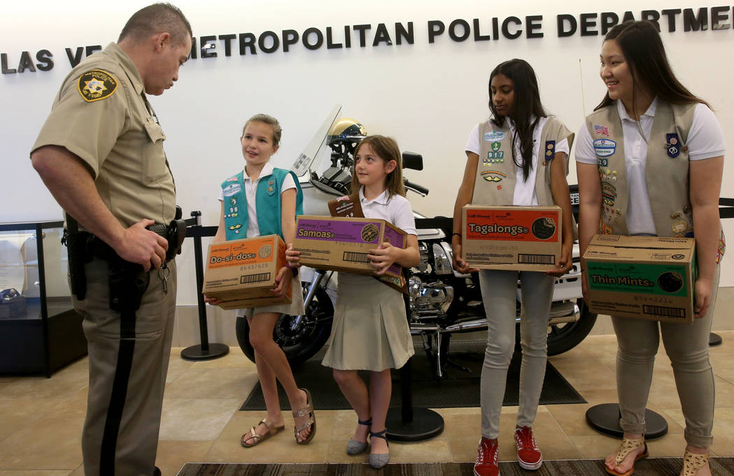 Girl Scouts of Southern Nevada, from left, Kendall Tiffany, 11, Juliette Hoffman, 9, Lily-Renee ...